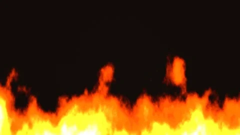 Vivid flames glow against a dark backdrop in orange and Stock Footage 338224378