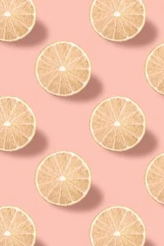 Vivid fruit pattern of fresh lime on colourful background Stock Photos