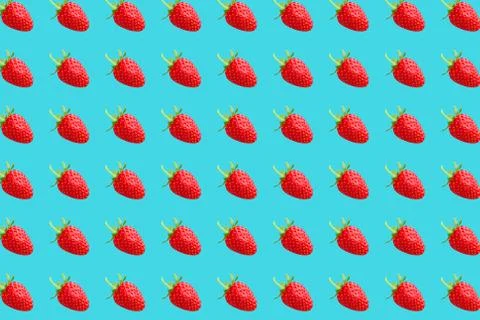 Vivid fruit pattern of fresh strawberry on colourful background Stock Photos