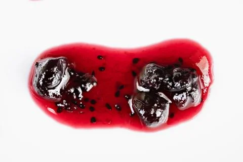Vivid jam closeup. Intimate image showcasing textured currant jelly in studio se Stockfoto's