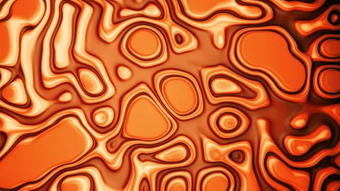 Vivid orange liquid waves on vibrant oil surface with light glares. Motion Video stock 133511608