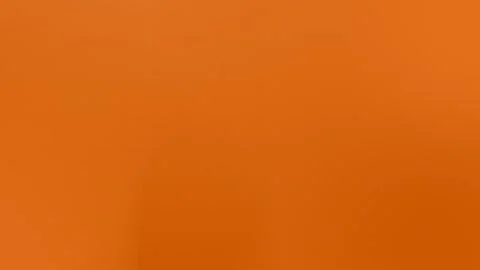 Vivid orange seamless loop background with soft gradients and smooth texture, Vídeo Stock 309058974