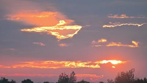 Vivid Orange Sunset over Lake with Clouds Stock-Footage 345032876