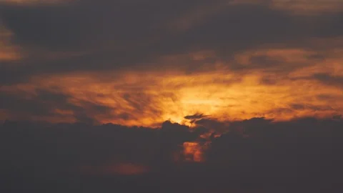Vivid red sky at sunset with dramatic dark clouds time lapse Stock Footage 111842269