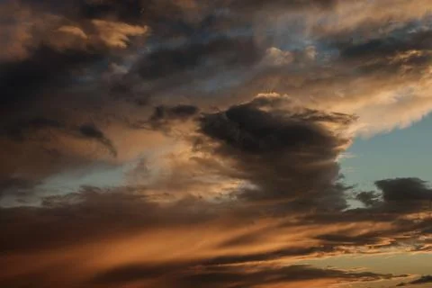 Vivid sky on dark cloud before summer storm Stock Photos