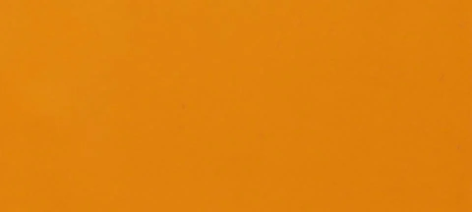 A vivid solid orange surface Foto stock