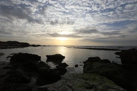 Vivid sunset over ocean with clouds High quality Stock Photos