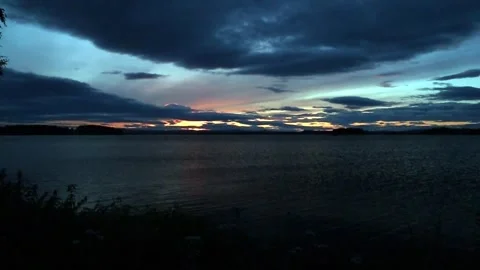 Vivid sunset by the river Stock Footage 250476863