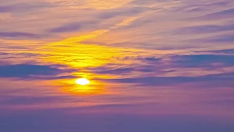 Vivid Sunset Sky with Orange and Purple Colour Gradient Above Clouds Stock Footage 331742090