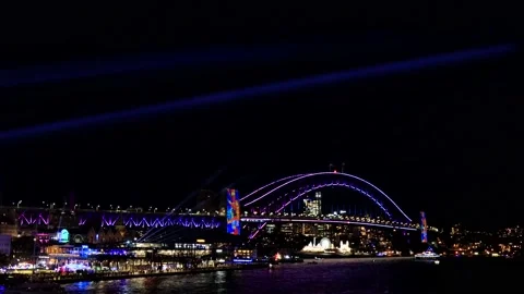 Vivid Sydney light show around Circular Quay in Sydney at night – 4k. Stock Footage 205098367
