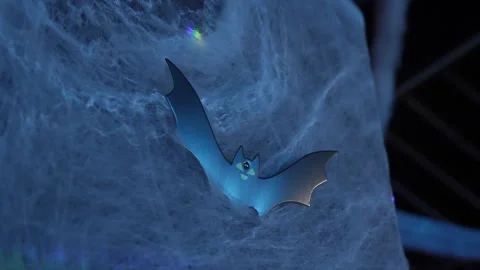 Vivid Ultraviolet Laser Light Illuminates Colorful Bat Resting On Complex Web Stock-Footage 323776094