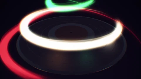 VJ Loop - Multicolored light streak swirls over spinning vinyl record Stock Footage 35803690