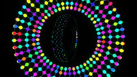 VJ Loop rotation of an abstract torus flashing with multicolored lights 02. Stock Footage 165803585