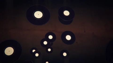 VJ Loop - Vinyl records morph into cassette tapes Stock Footage 35819396