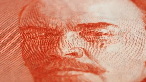 Vladimir Lenin on old Russia rouble rotating. Macro shot. Low angle. 4K Stock Footage 123799084