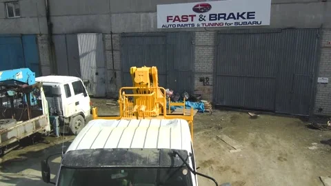 Vladivostok, Russia - 04.2020: drilling machine drives a parking lot Stock Footage 130572553