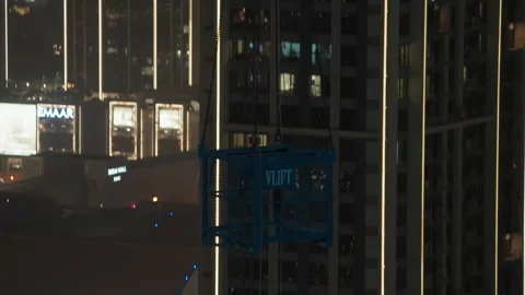 VLIFT platform descends past Emaar towers in Dubai UAE 库存影片 344915097