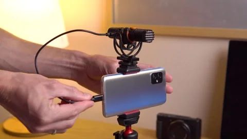 Vlog setup with smarthone and microphone on tripod in vlogging studio. Led Stock Footage 243980205