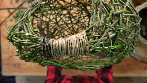 Vlog Style Close Up For Tutorial Of How To weave Handle For Willow Basket Stock Footage 253339044