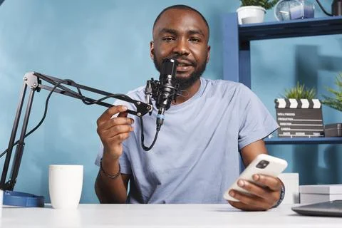 Vlogger creating podcast content Stock Photos
