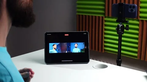 Vlogger Demonstrating Video Shooting on Tablet and Smartphone Stock Footage 315439982
