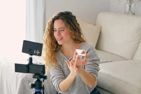 Vlogger recording makeup tutorial for social media blog 스톡 사진