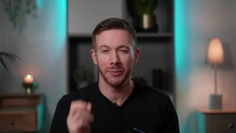 Vlogger Young Man Talking To Camera, Recording Online Tutorial Video Stock Footage 243575612
