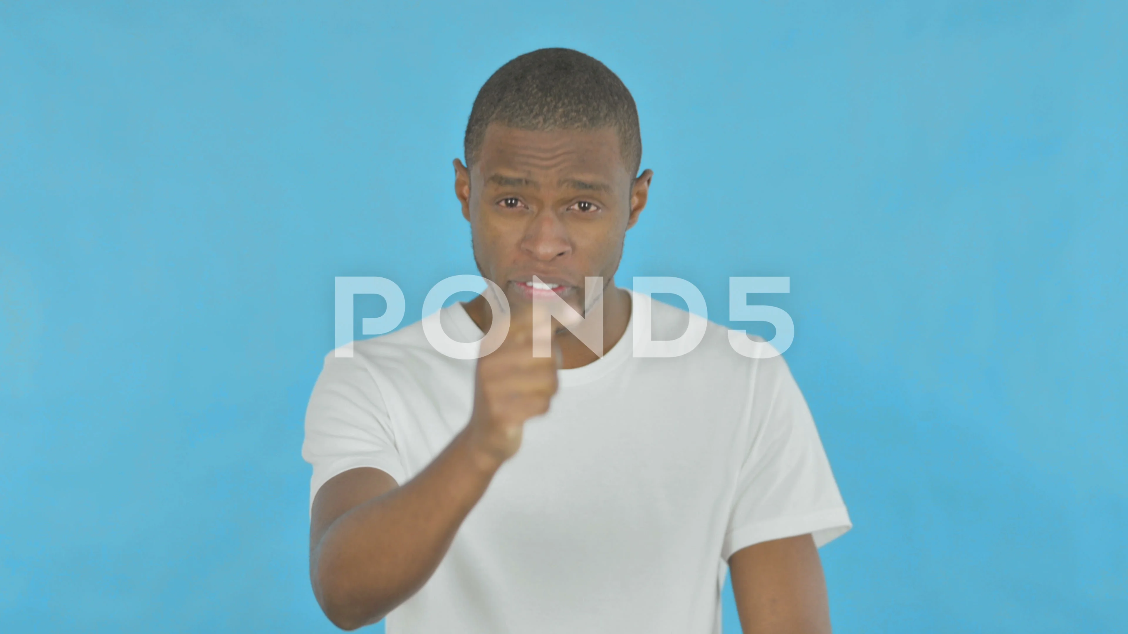 Vlogging African Man Talking on Video Chat on Blue Background