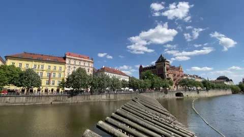 Vltava River View Historic Waterfront Architecture Trams Prague - May 30 2026 動画素材 336384789