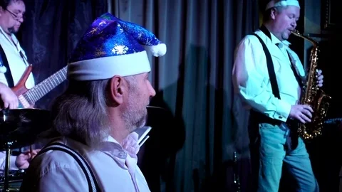 Vocal group performance in front of the audience. In the foreground, a man wi Stock Footage 83830286