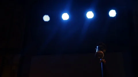 Vocal stage microphone holding on microphone stand on the stage dark background. Stock Footage 88025130