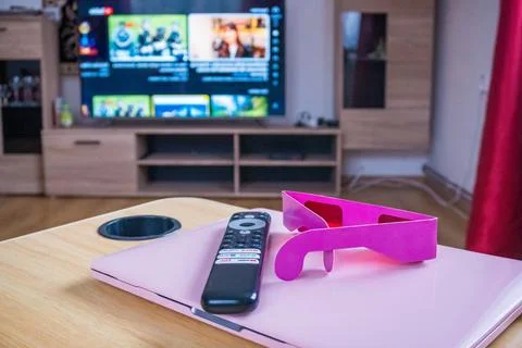 VOD service screen with remote control with 3D glasses. SHOTLISTstream Stock Photos