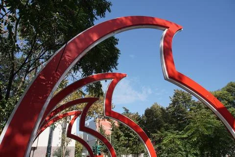 Vodafone logos arching over a small Lana river bridge as lights and decoration. Stock Photos