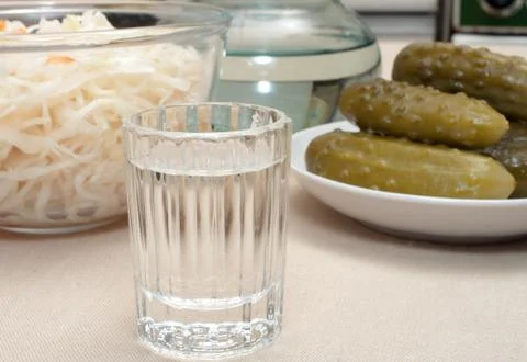 Vodka and snack. Stock Photos