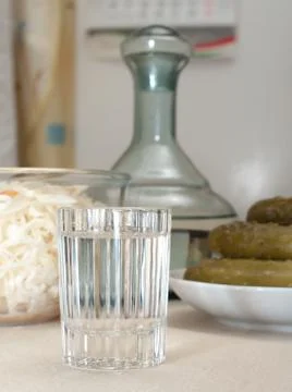 Vodka and snack. Stock Photos
