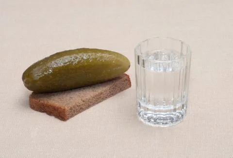 Vodka and snack. Stock Photos