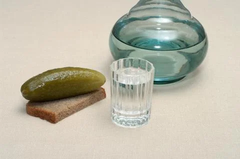 Vodka and snack. Stock Photos