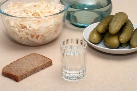 Vodka and snack. Stock Photos