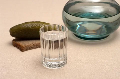 Vodka and snack. Stock Photos