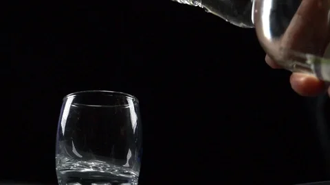 Vodka is poured into a stack Stock Footage 119283000