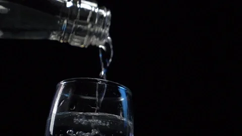 Vodka is poured into a stack Stock Footage 119283012