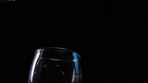 Vodka is poured into a stack Stock Footage 119283014