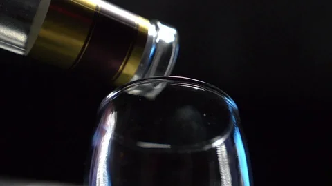 Vodka is poured into a stack Stock Footage 119283033