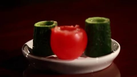 Vodka in vegetables. Cucumbers and tomatoes instead of stacks for vodka. Stock Footage 80309461