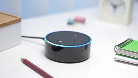 Voice Activated amazon Echo Dot Assistant on Desk Video stock 100923193