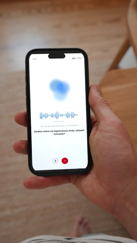Voice assistant in the kitchen setting an egg timer, vertical in Polish Stock Footage 346912103