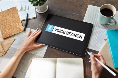 Voice search application on device screen. Internet and technology concept. Stock Photos