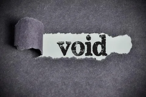 Void word under torn black sugar paper Fotos Stock