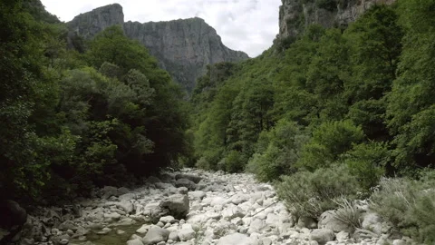 Voidomatis river dry stream bed in  Vikos Gorge, Zagorochoria, Epirus, Greece Stock Footage 277404227