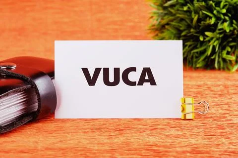 Volatility Uncertainty Complexity Ambiguity. VUCA text on a white card on an  Stock Photos